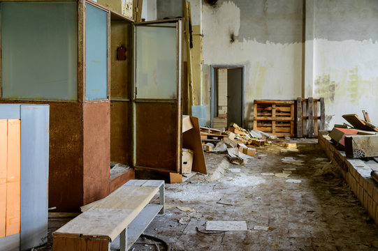 Photo of an abandoned room and garbage dump