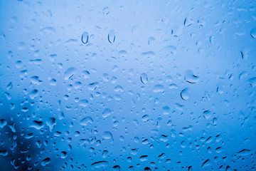Morning raindrops on a windshield 