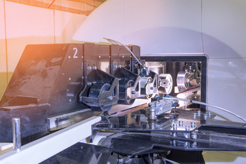 Woodworking machine. Automated line. The board drives into the machine. Modern wood processing technology.