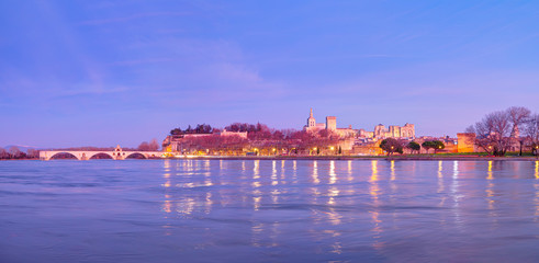 Pont Saint Benezet bridge on the Rhone River  and  Palace of the Popes ( Palais des Papes) and...