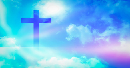 Christian cross appeared bright in the sky with soft fluffy clouds, white, beautiful colors. With the light shining as hope, love and freedom in the sky background
