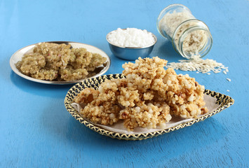 Sandige, a south Indian traditional, popular, vegetarian, crispy, and crunchy side dish, and raw sandige and its main ingredients flattened rice and sago.