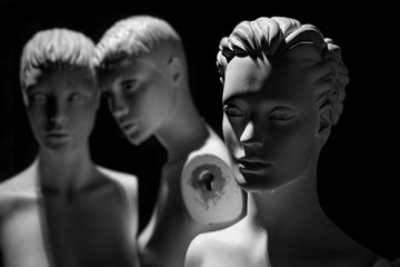 Isolation - Mannequins arranged on black