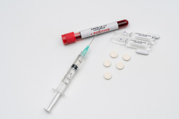 COVID 19 Coronavirus, infected blood sample in the sample tube, Vaccine and syringe injection It use for prevention, immunization and treatment from COVID-19