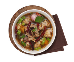 spicy thai red curry beef on white background