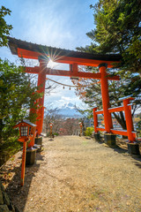 View of red gate shrine at Chureito pagoda in Fujiyoshida, Japan.
