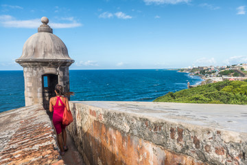 Puerto Rico travel cruise ship destination people walking at Castillo San Felipe del Morro in Old...