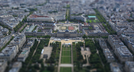 View of Paris out of Eiffel Towel, down the Champs de Mars, Paris, France.Ttilt shift effect.