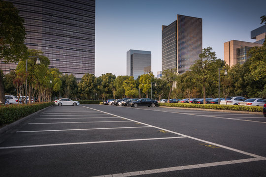empty brick floor with city skyline background
