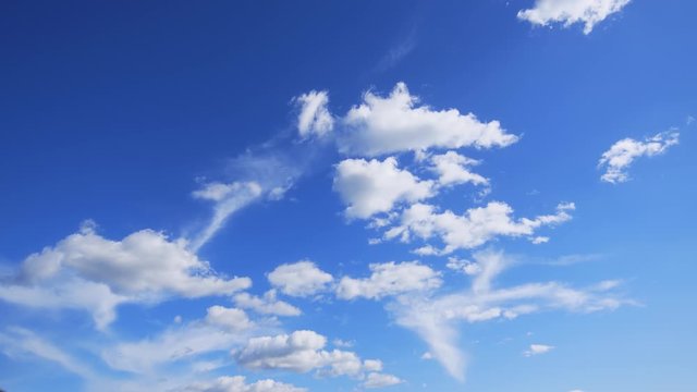 Timelapse of day blue sky with cumulus clouds