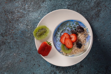 Spirulina. Blue and green.Fresh fruit smoothie bowl. Healthy breakfast vegan concept