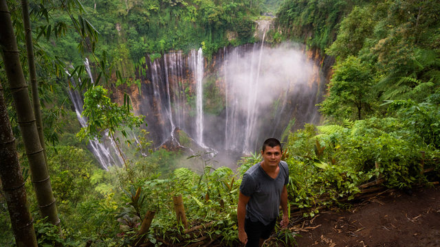 Waterfall Tampak Planting portrait of the guy above Indonesia
