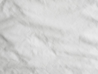 Fototapeta premium Soft white wrinkled fabric background