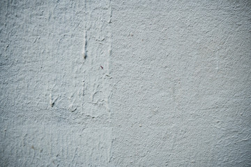 Texture of an old wall covered with paint. Background image of a worn paint coated surface