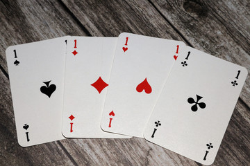 Obraz premium playing cards four aces, a good combination of four of a kind in poker
