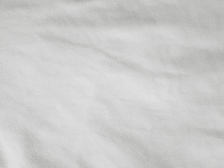 Soft white wrinkled fabric background