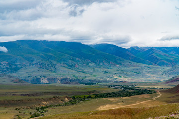 Background image of a mountain landscape. Russia, Siberia, Altai