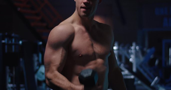 Body builder working out in gym