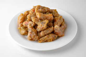 Dolma. Cabbage rolls from cabbage, grape leaves and rice with meat. Stuffed peppers. Banquet festive dishes. Gourmet restaurant menu. White background.