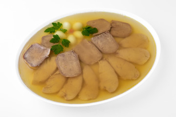 Jellied of different types of meat, beef, pork and poultry. Jelly from broth and vegetables. Banquet festive dishes. Gourmet restaurant menu. White background.