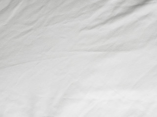 Soft white wrinkled fabric background
