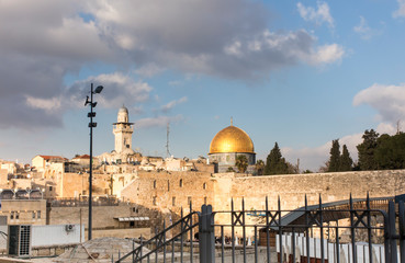 Al-Aqsa Mosque, the shrine of Islam in Jerusalem. Dome of the Rock, located on the Temple Mount in the Old Town, in the foreground a wailing wall