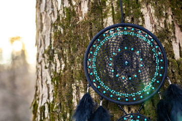 Handmade dream catcher with feathers threads and beads rope hanging