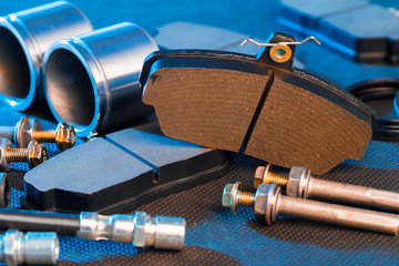 brake pads on dark background close up view