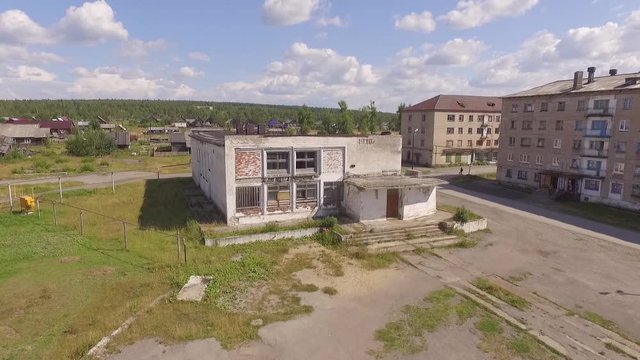 Destroyed and abandoned houses in the Yubileiniy city, Perm region, Russia, Aerial