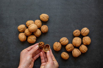 Walnuts on dark gray background，NUTTY health food,