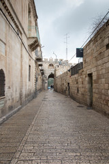 Fototapeta na wymiar narrow empty street in old Jerusalem, Israel