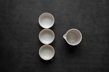 Obraz na płótnie Canvas Empty Cup of tea on dark gray background,top view.