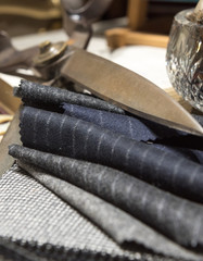 Tailor's Scissors and Suit Swatches