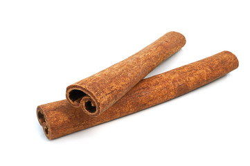 Cinnamon sticks isolated on white background closeup