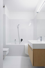 Fototapeta na wymiar Bathroom in white and grey tiles