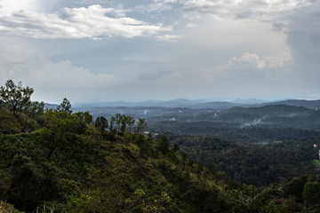 Misty mountains range with amazing sky