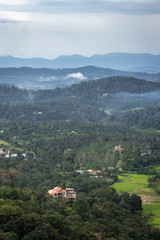 Misty mountains range with amazing sky
