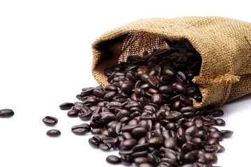 piled heap coffee beans roast dark brown colour textured and sack bag isolated on white backgrounds