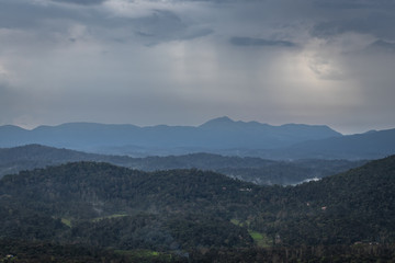 Obraz premium Misty mountains range with amazing sky