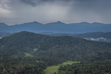 Misty mountains range with amazing sky