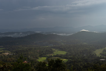 Misty mountains range with amazing sky