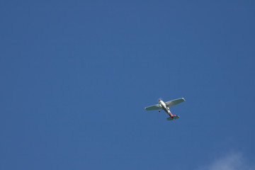 Clear sunny day. Silence and peace. Blue clear sky. The plane rises up.
