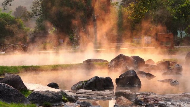 Hot Springs Onsen Natural Bath at National Park Chae Son, Lampang Thailand.In the morning sunrise.Natural hot spring bath surrounded by mountains in northern Thailand.