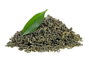 Pile of dry green tea with green tea leaf isolated on a white background