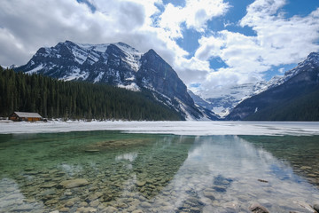 Fototapeta na wymiar Mount fairview, partly frozen lake, Lake Louise Banff National Park, Alberta Canada