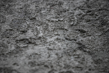 Road pits in the city in the spring after the snow melts. Problem of roads and asphalt in the city.