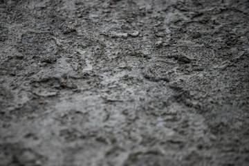 Road pits in the city in the spring after the snow melts. Problem of roads and asphalt in the city.