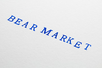 a bear market word stamped on a piece of paper.