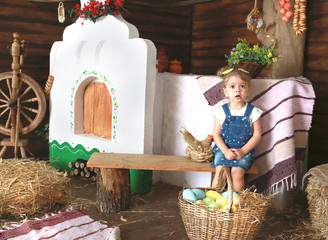 little cute girl with easter eggs and purse