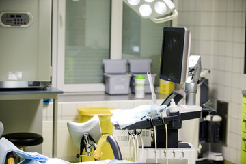 Gynecological surgery room with chair and equipment in Reproductive medicine Clinic. Selective focus, artificial insemination operating room